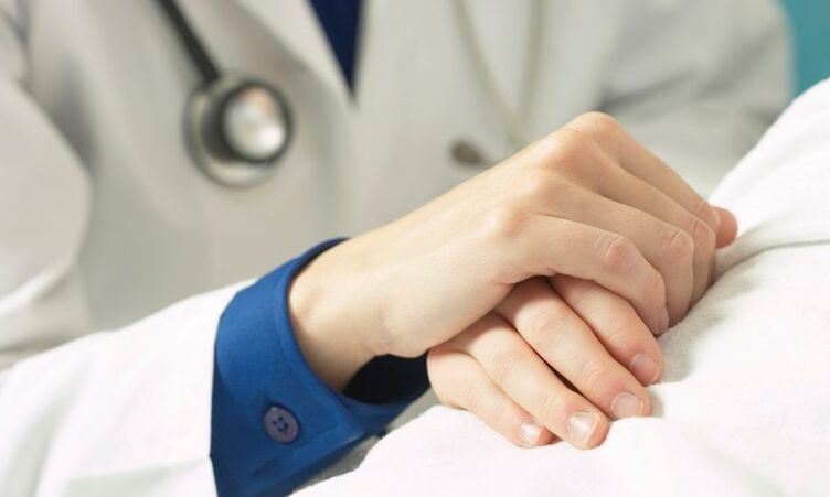 A doctor helps a patient with prostatitis